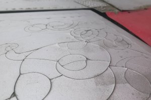 Spiral patterns in the decaying metal of a plane's wing